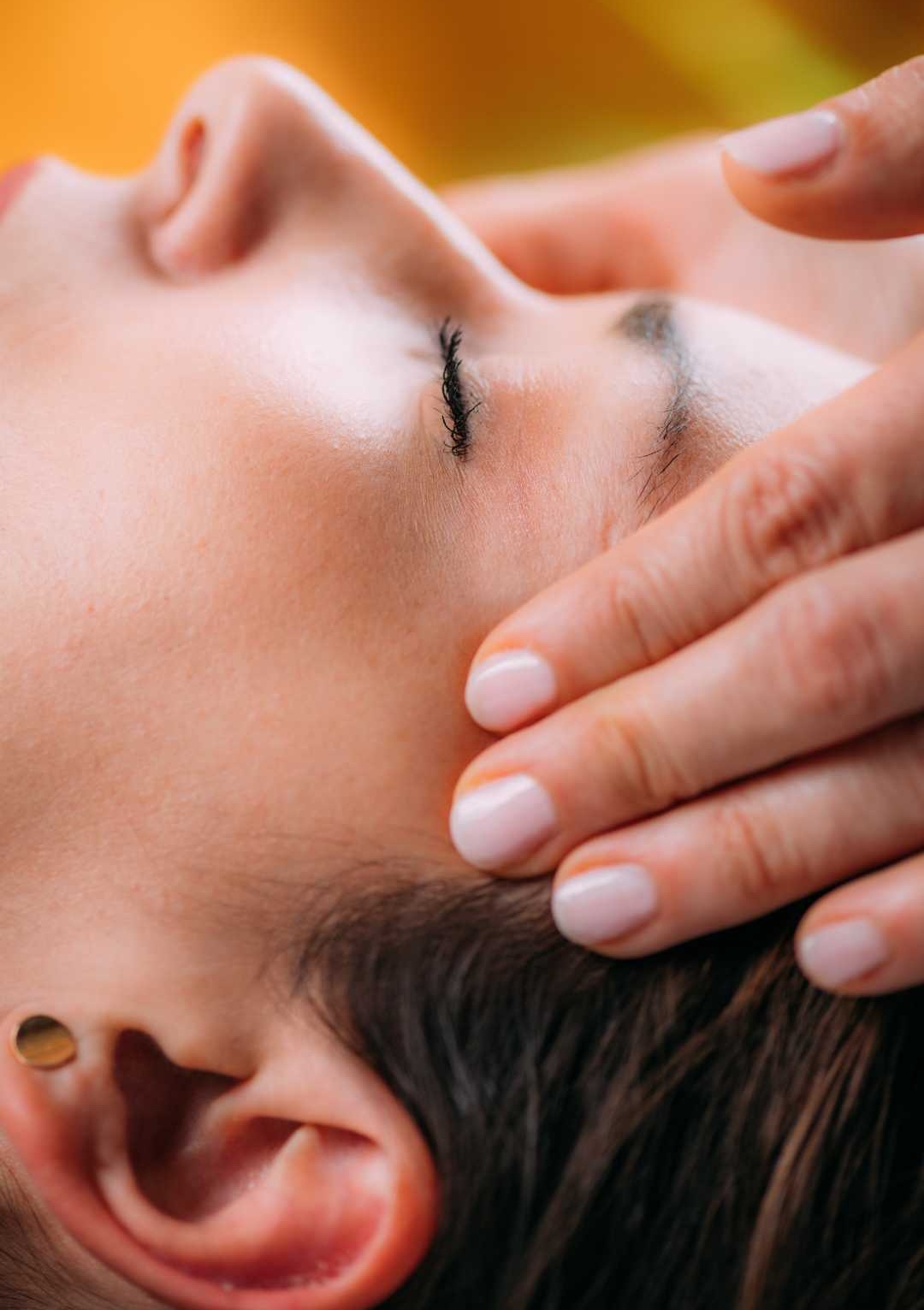 Craniosacral therapy CST hands on forehead